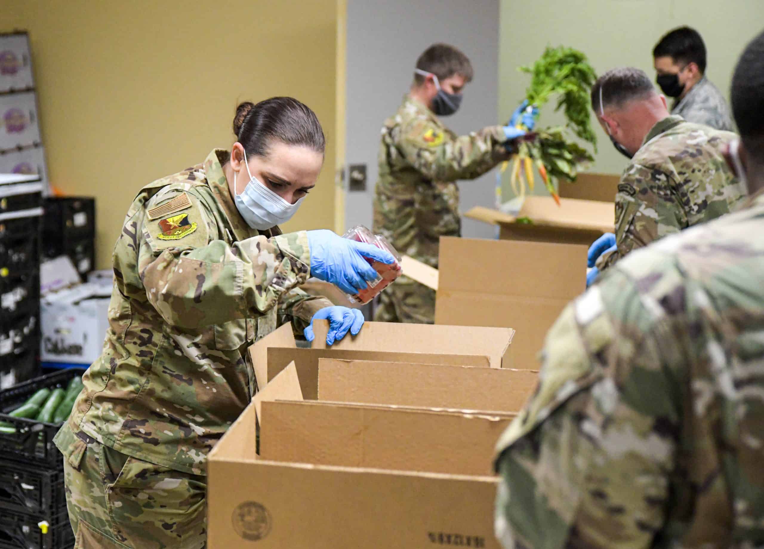 Soldiers Packaging Food